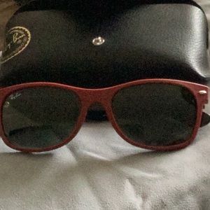 Ray-Ban Wayfarer sunglasses.